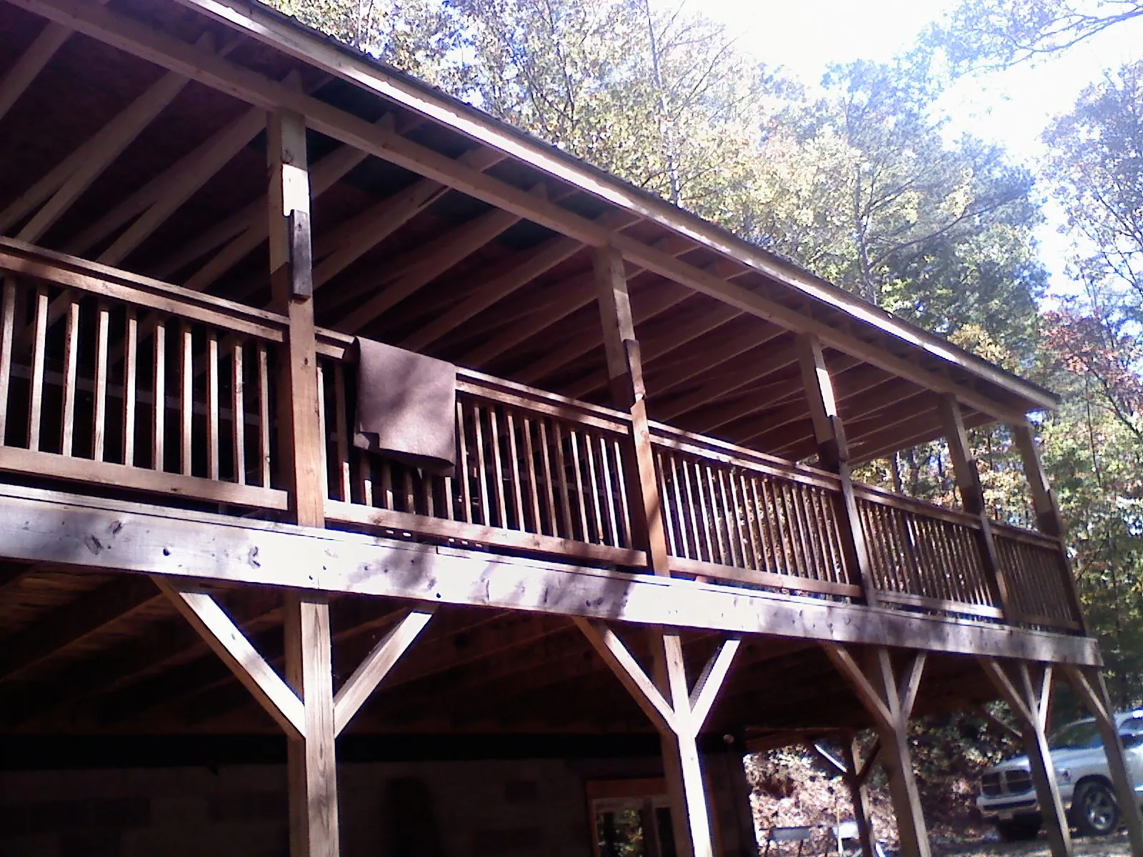 Timber framing under a new elevated porch and deck — Roof Leak Repair in Ligonier by Roofing Brothers